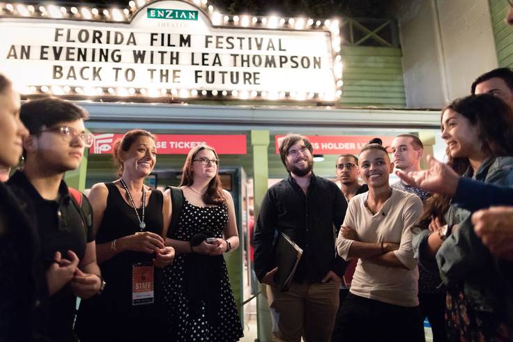 Rollins students outside the Enzian theater at the Florida film festival.