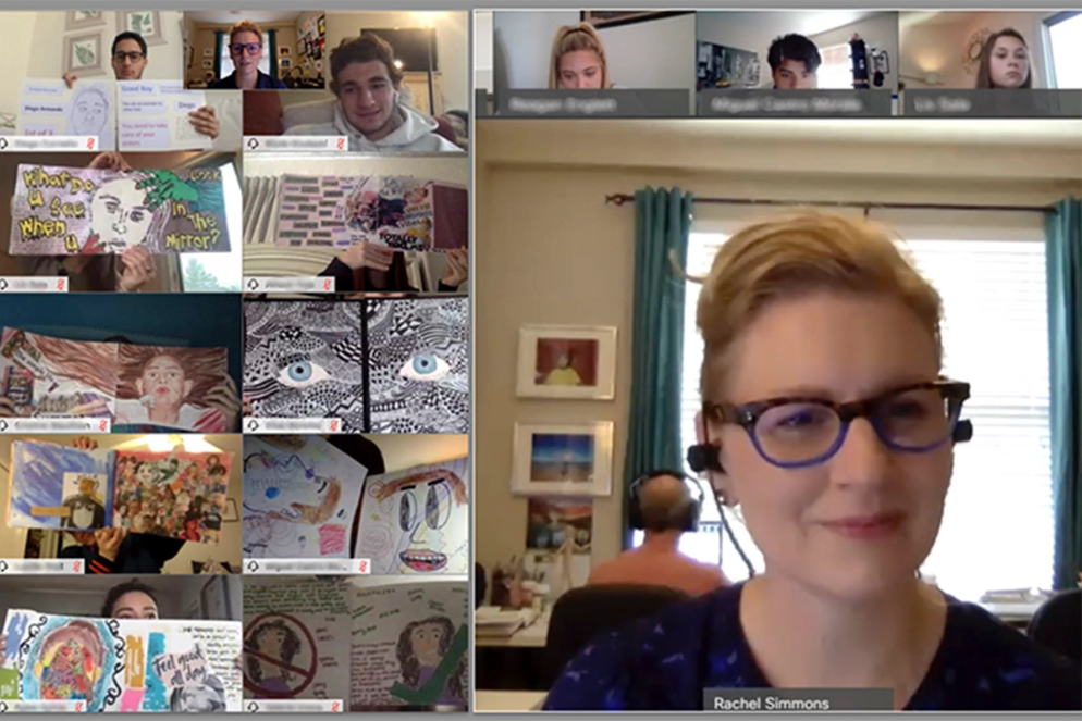 Art professor Rachel Simmons and her students share their visual journals during a collaborative video conference.