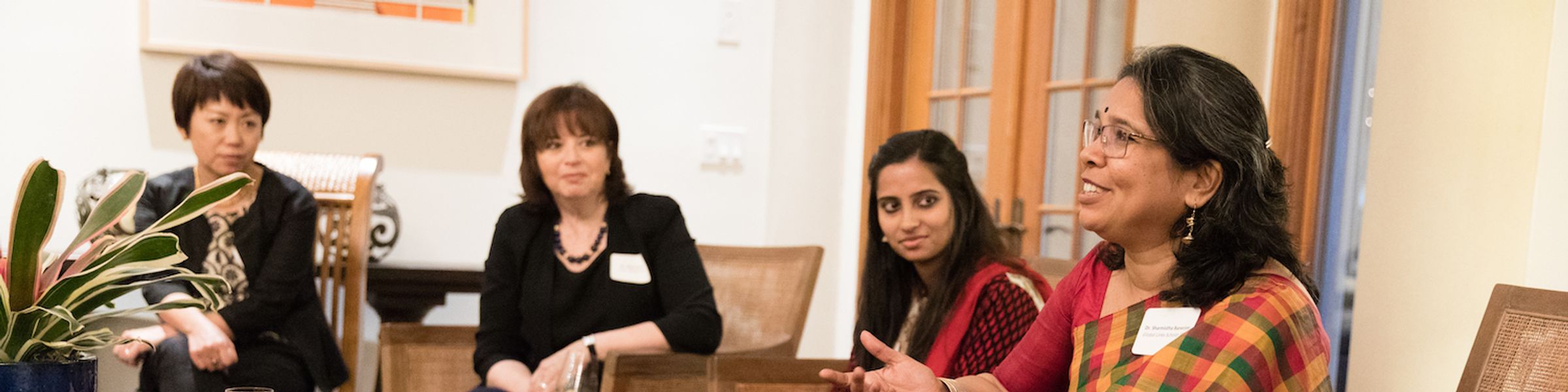 International scholars meeting with Rollins professors