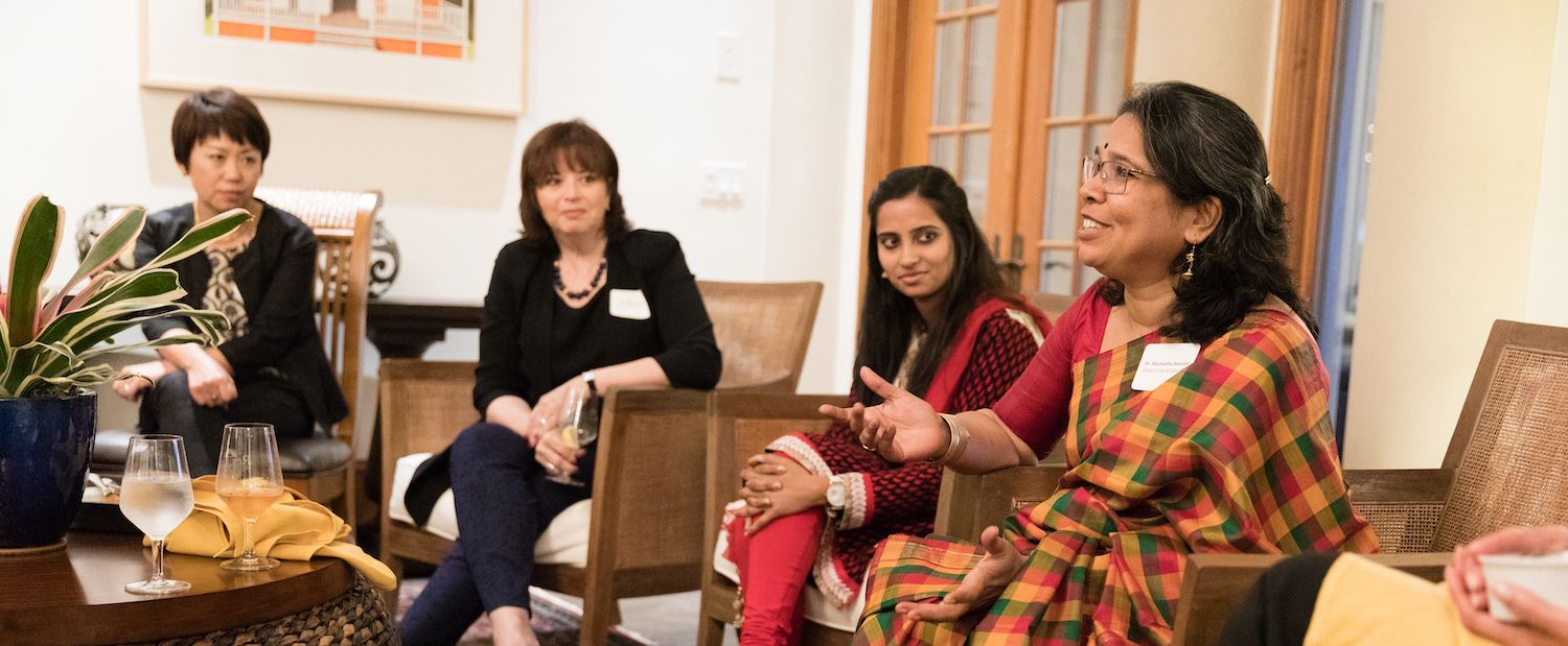 International scholars meeting with Rollins professors