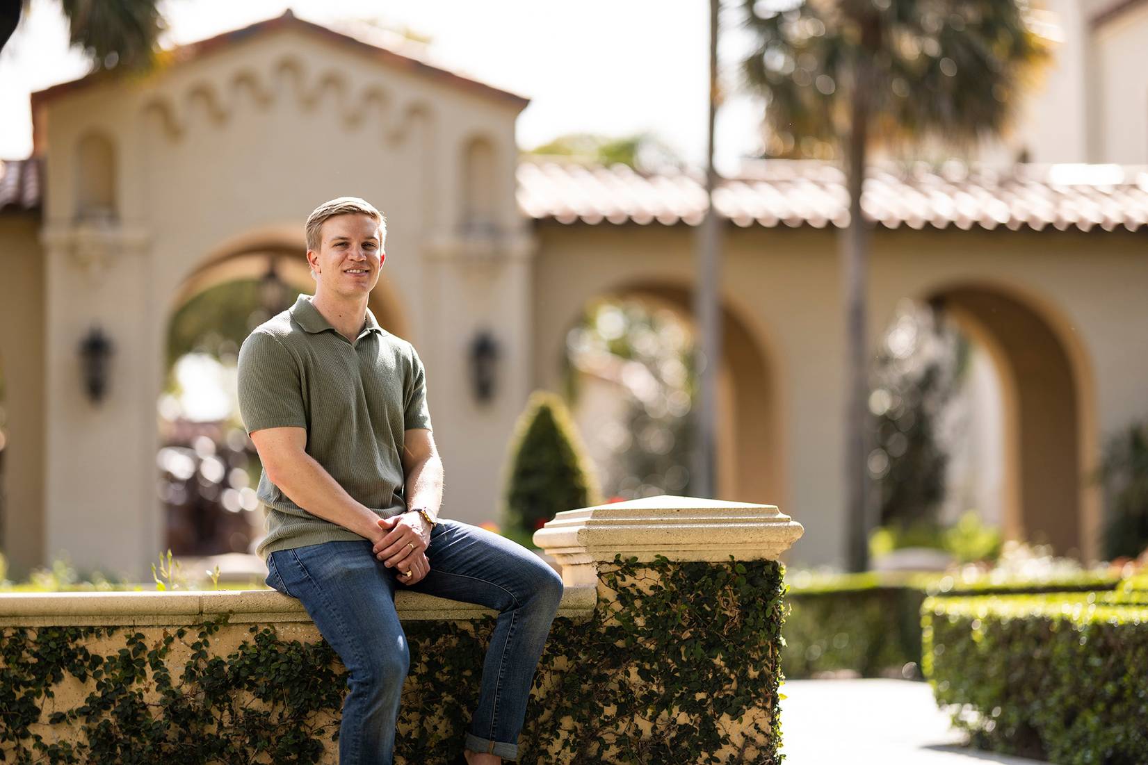 Connor Celentano in the rose garden at Rollins College