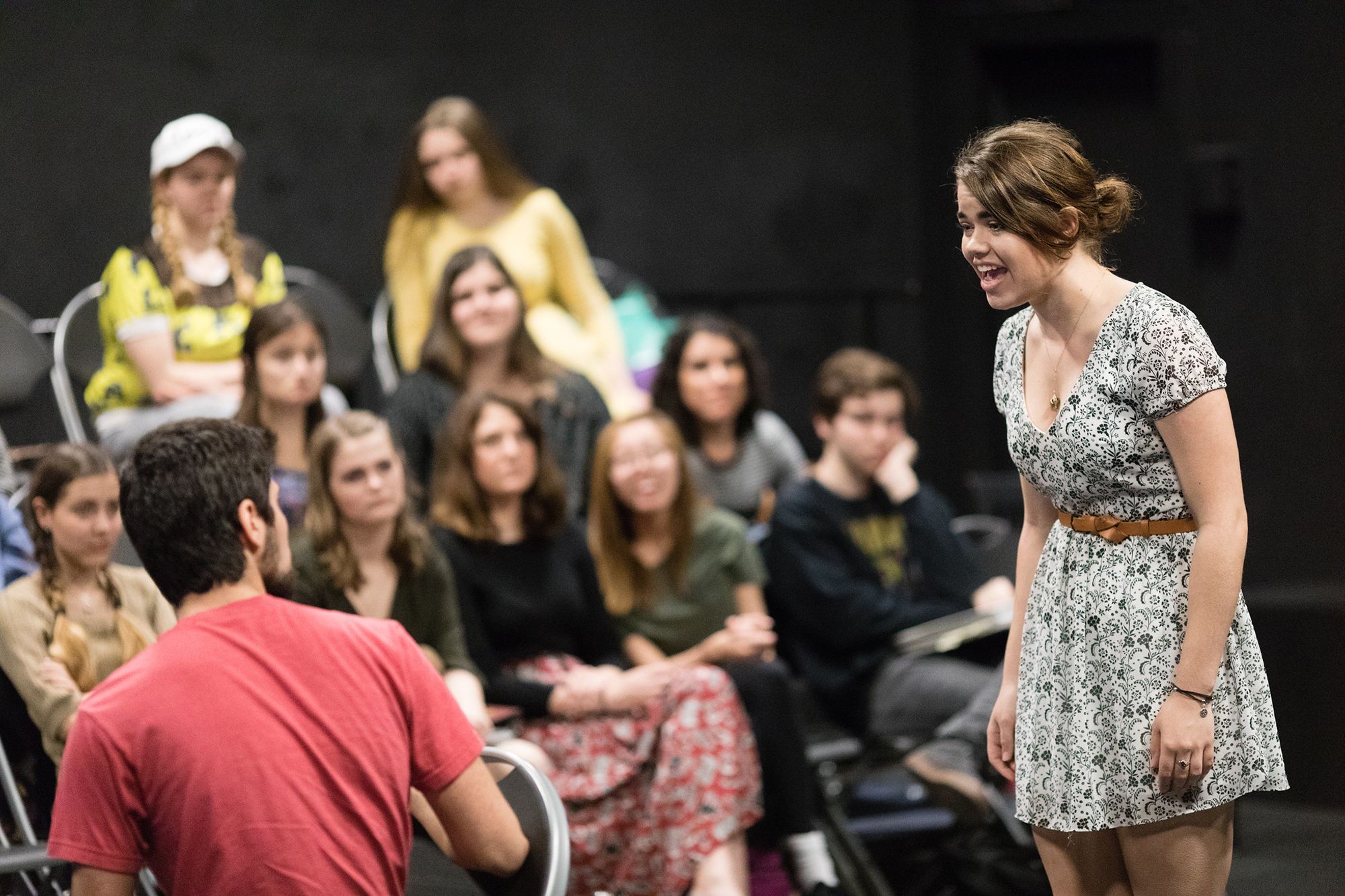 Theatre students acting out a scene in the black box theater at Rollins.