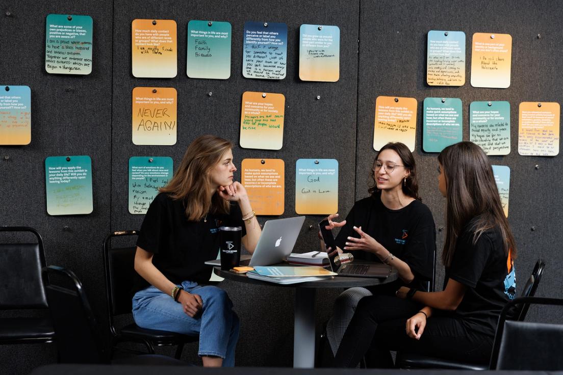 Emily Curran ’22, Leah Hornik ’22, and Kayley Klatt ’24 collaborate on programming ideas at the Holocaust Memorial Resource & Education Center.