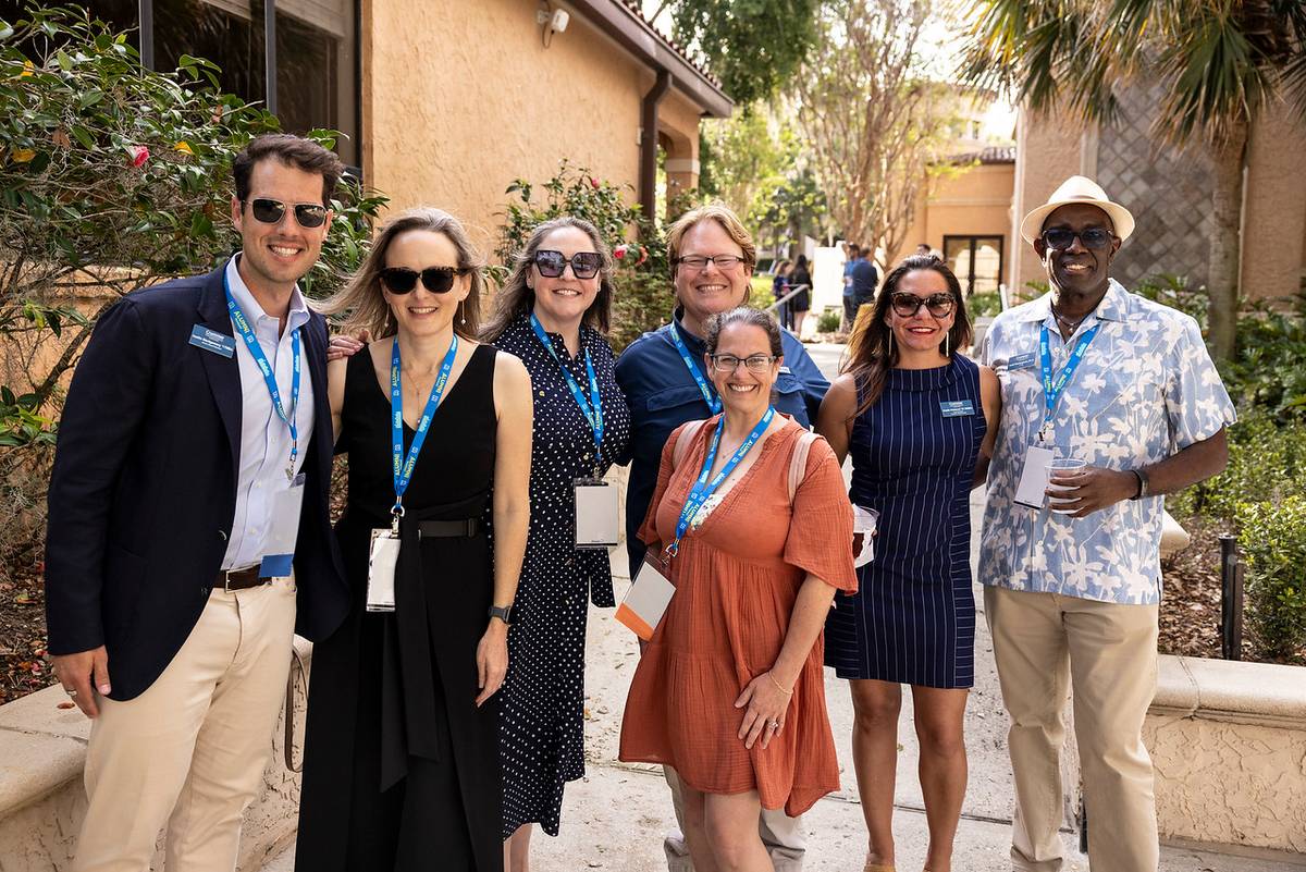 Group of alumni gathered outside the Rollins Museum of Art during Alumni Weekend.