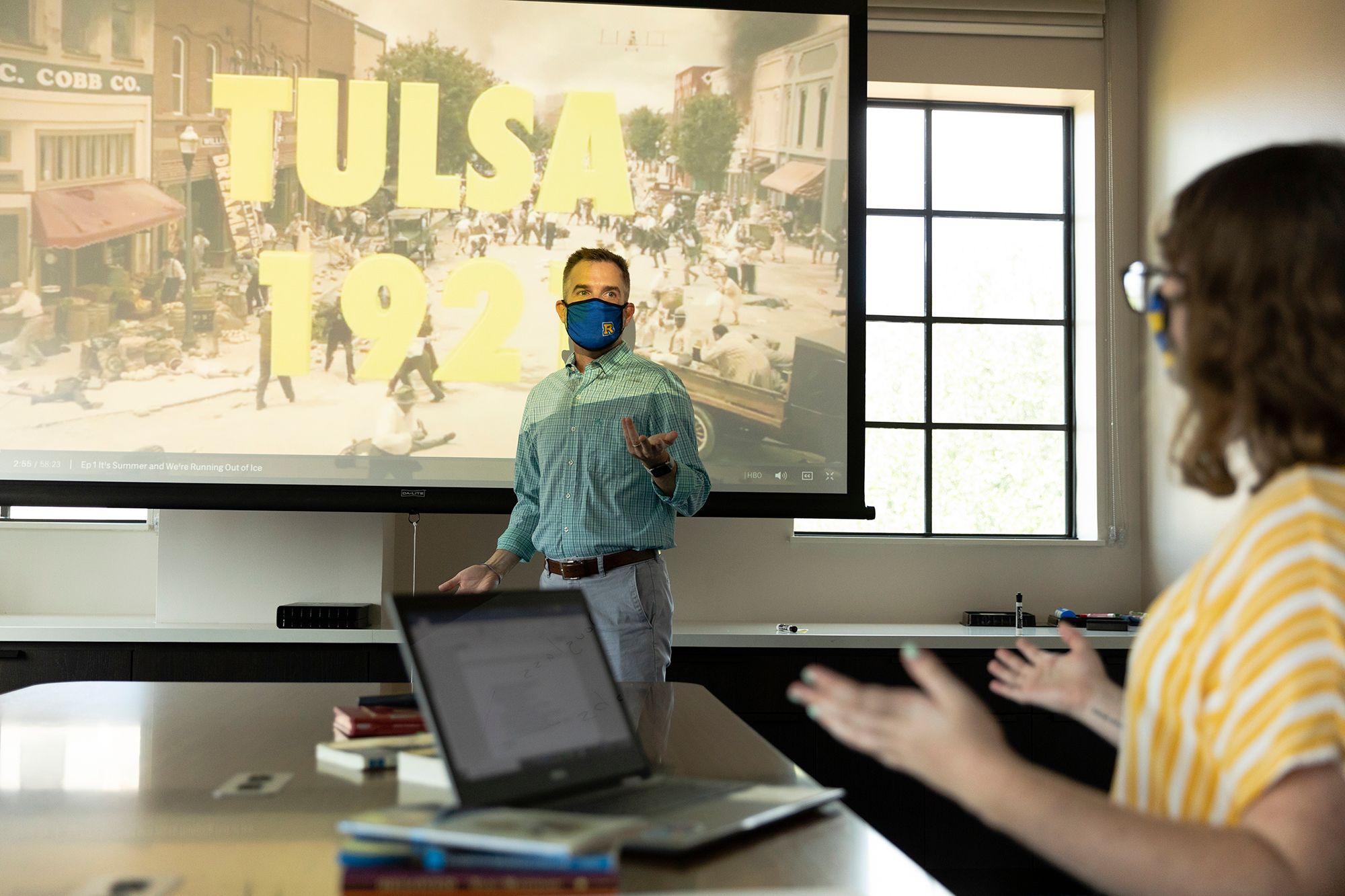 Professor and student discuss historical events for research on race.