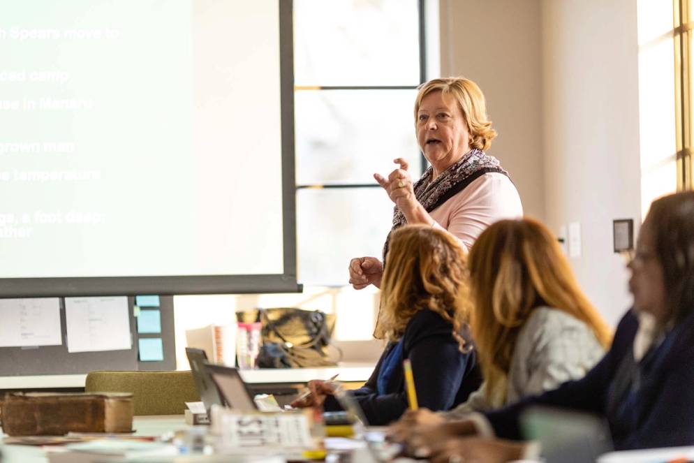 Education professor Debra Wellman teaches a class on social studies methods to Rollins Pathways students. 