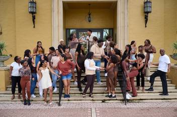 Members of the Black Student Union gather on the steps of Kathleen W. Rollins Hall in late January in anticipation of kicking off Black History Month at Rollins.