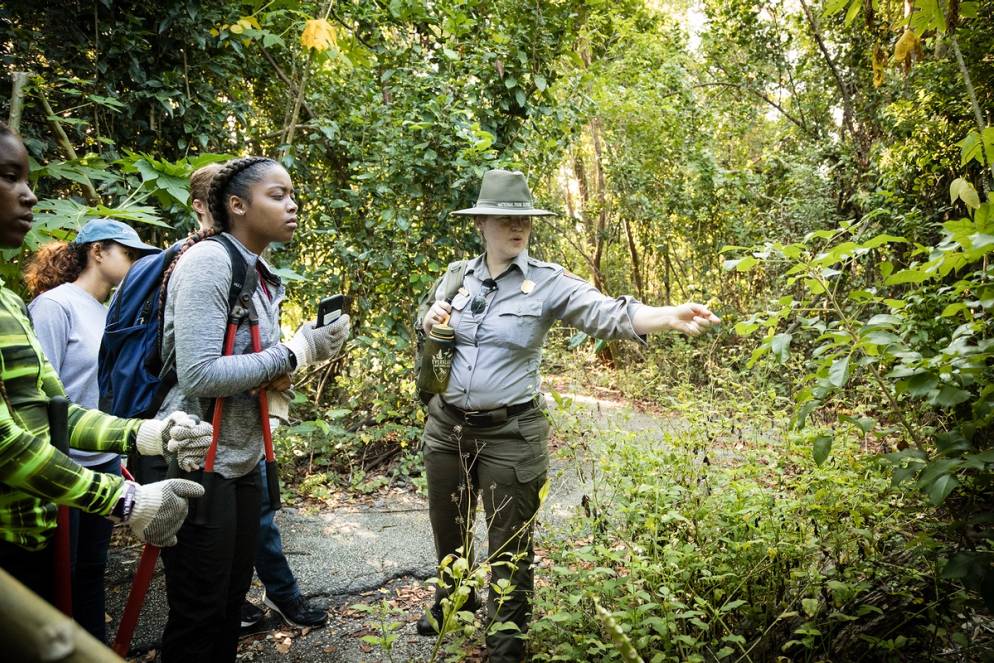 A park ranger educates students about the flora and fauna in the Everglades.