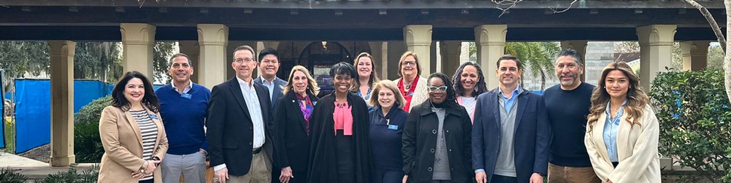 Group photo of alumni advisory board members on campus.