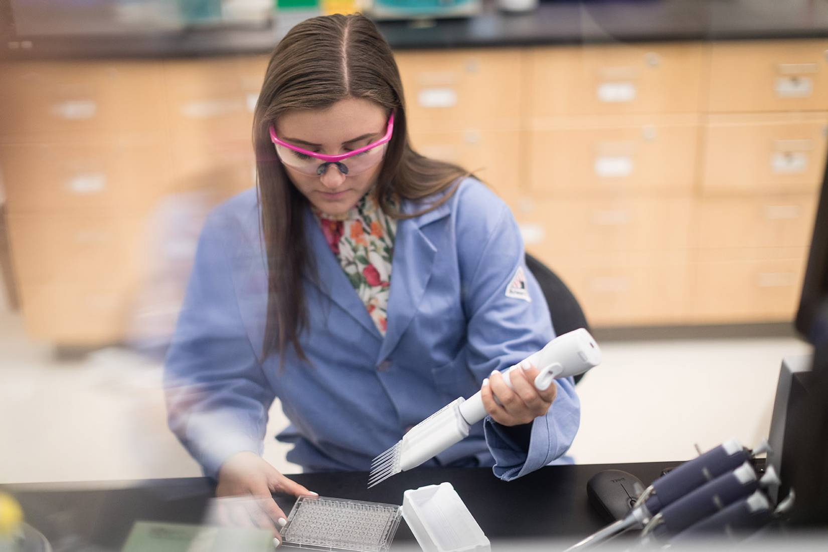 Ames working in the biology lab.