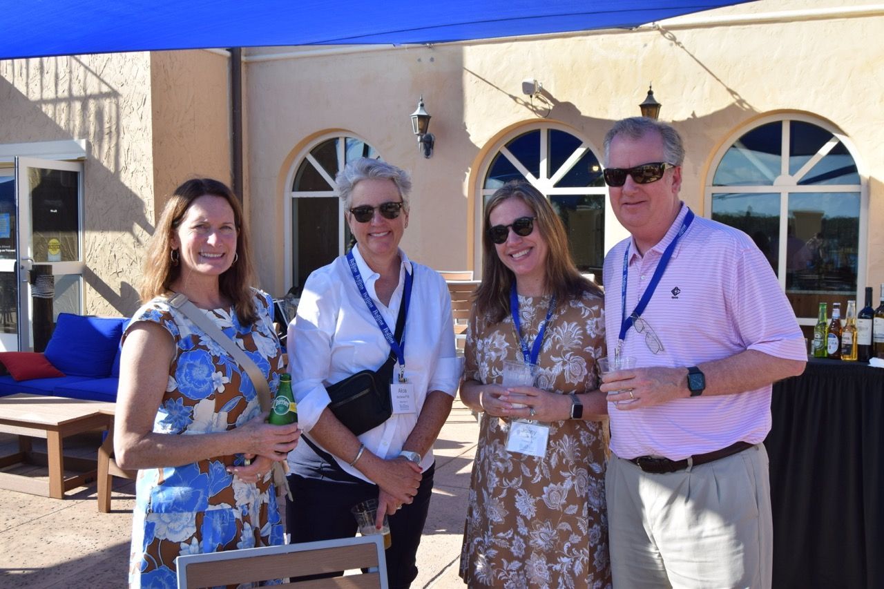 Rollins family laughing and enjoying a Winter Park boat ride.