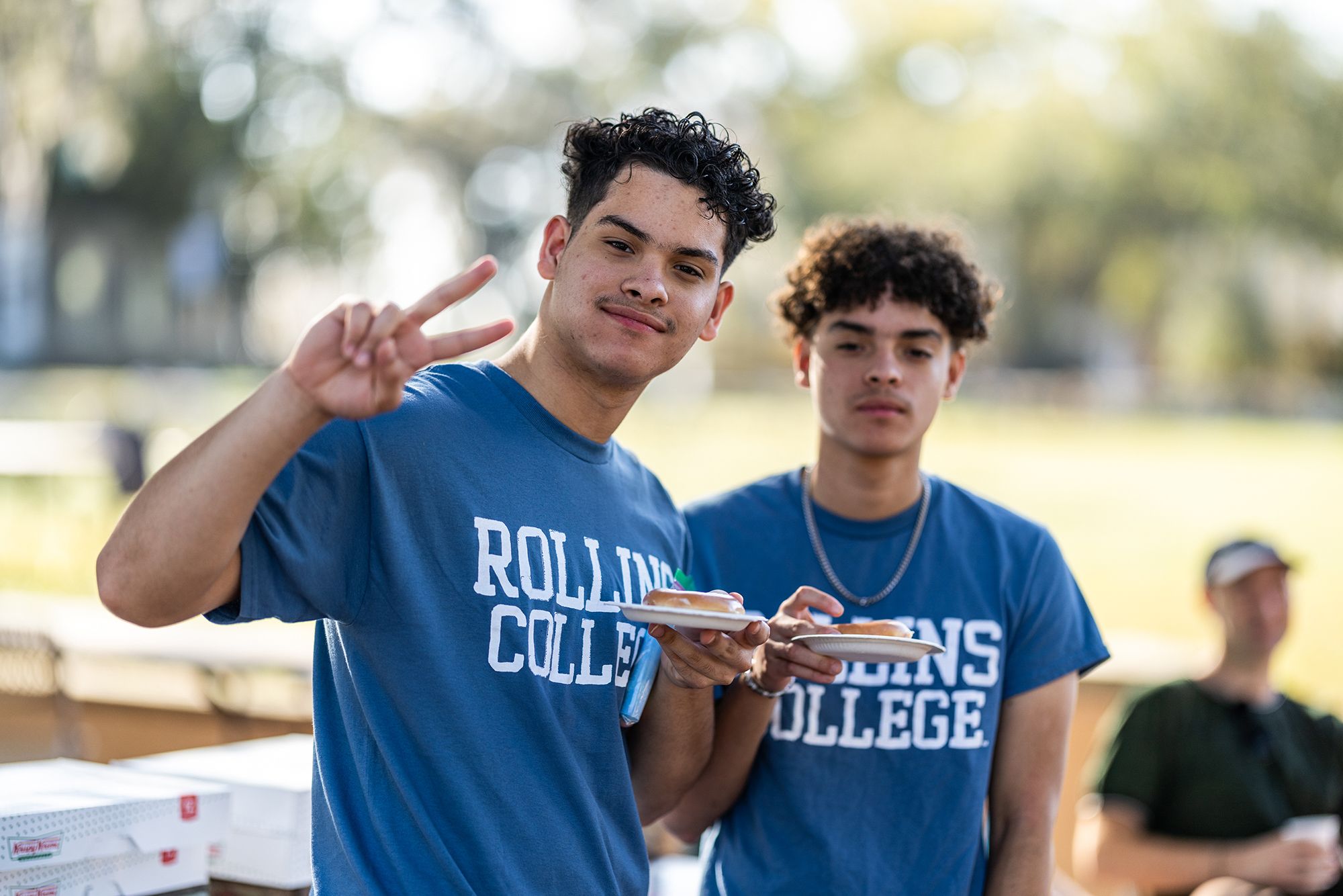 A pair of Rollins students pose for a photo during Acts of Kindness Day.