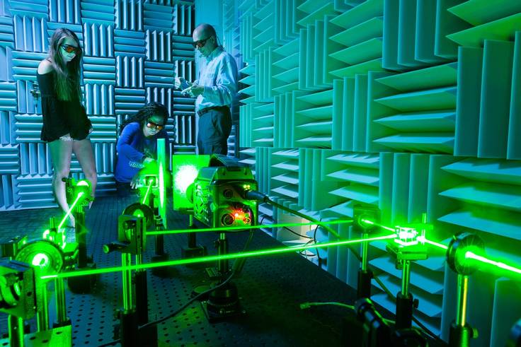 Physics professor Thom Moore and his students use lasers to study musical acoustics in Rollins’ anechoic chamber.