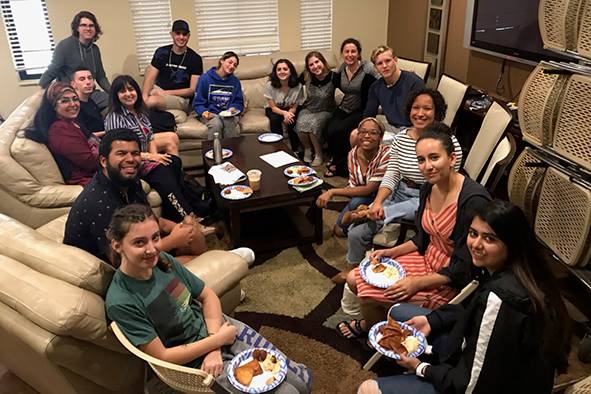 A group of Rollins College jewish studies students gather for a meal.