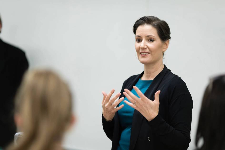 Libby Schaff guest lectures in a Rollins College political science class.