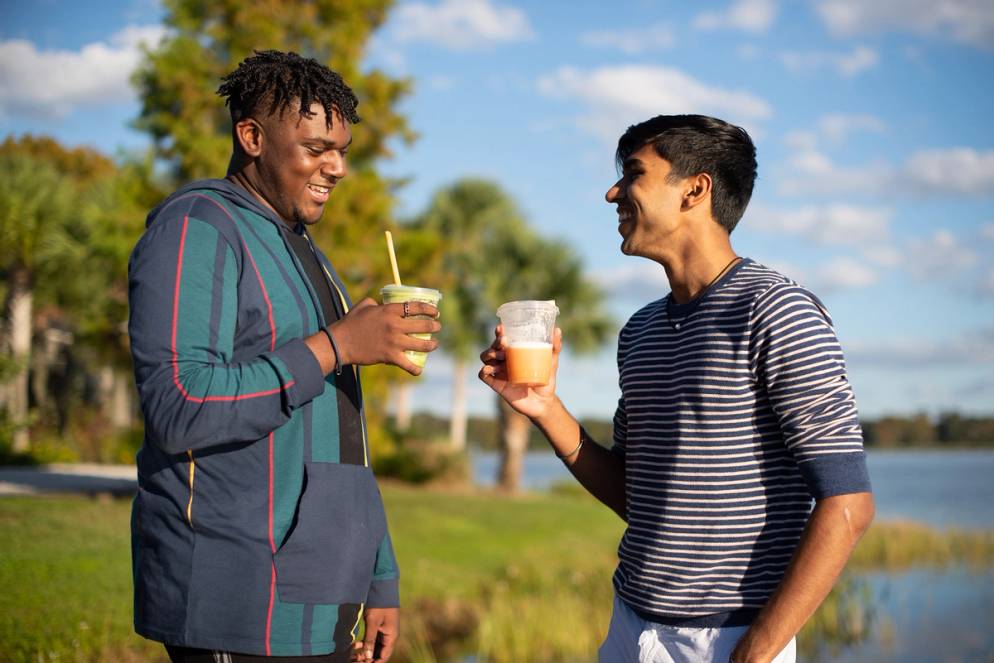 Students enjoying smoothies by Lake Virginia.