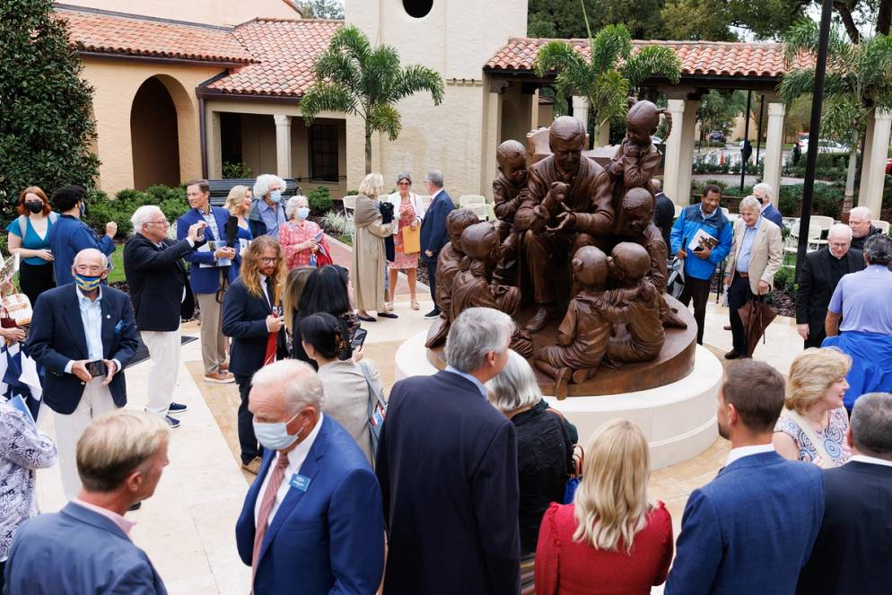 Gathering by the Mister Rogers sculpture for the unveiling event.