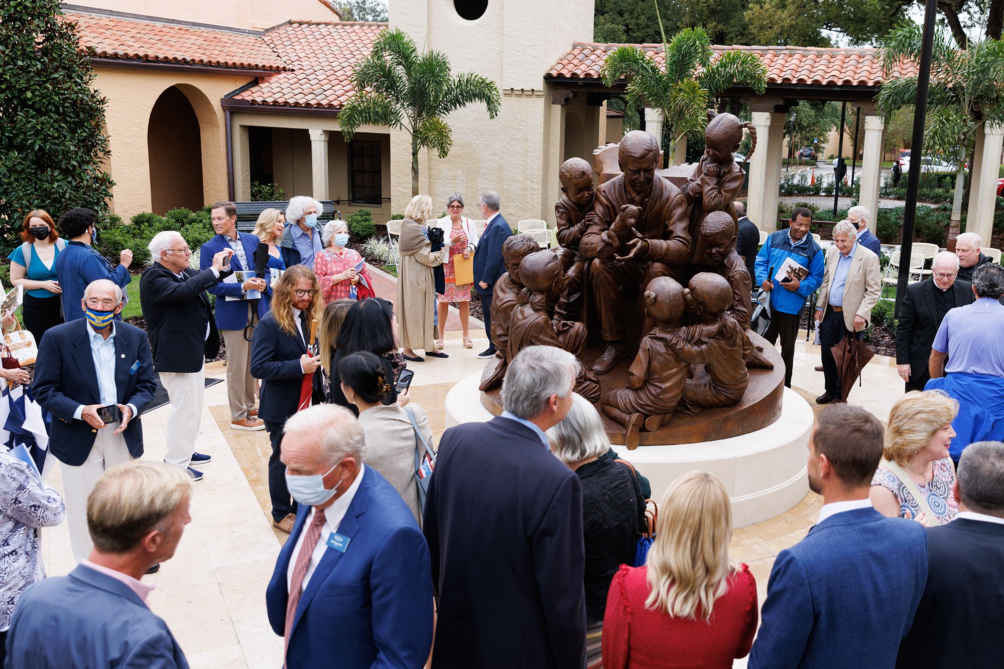 Gathering by the Mister Rogers sculpture for the unveiling event.