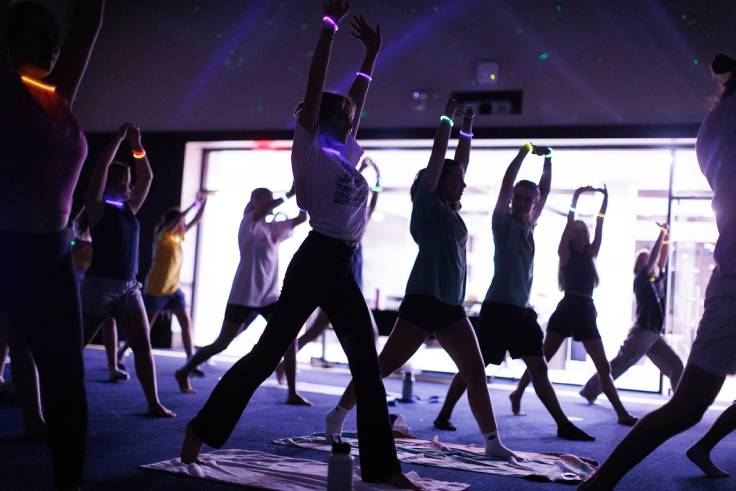Students in Lakeside Neighborhood partaking in glow-in-the-dark yoga