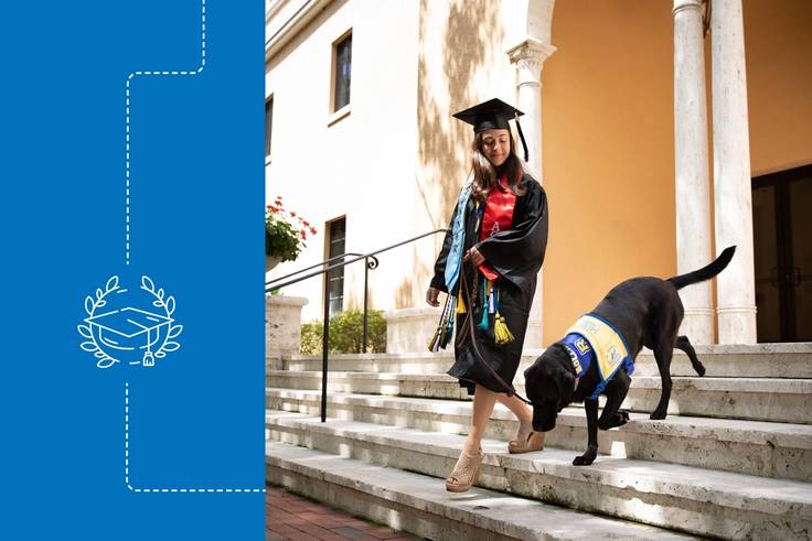 Marissa Cobuzio ’19 walking down steps with her service dog Ari on graduation day.