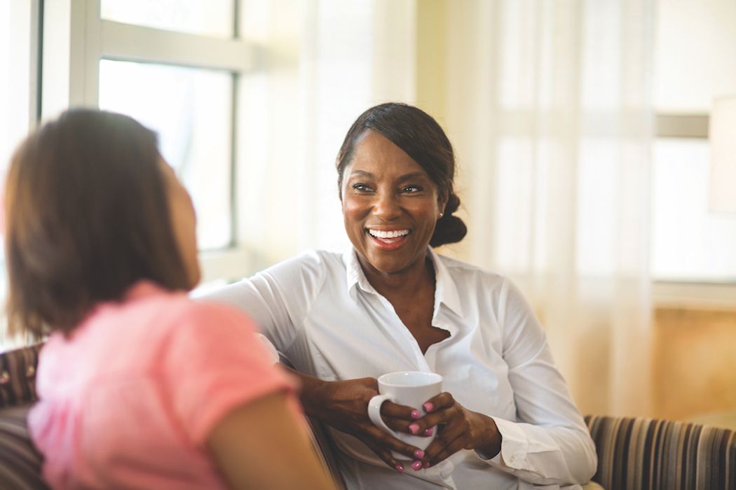 A clinical mental health counselor meets with a client.