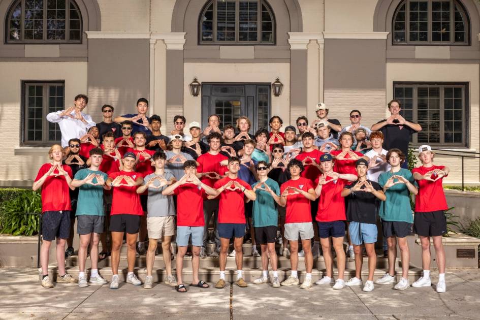 Tau Kappa Epsilon Fraternity brothers standing outside of their residence on Rollins campus.