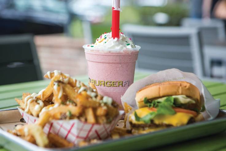 Cheeseburger, French fries, and a strawberry shake from Burger-Fi.