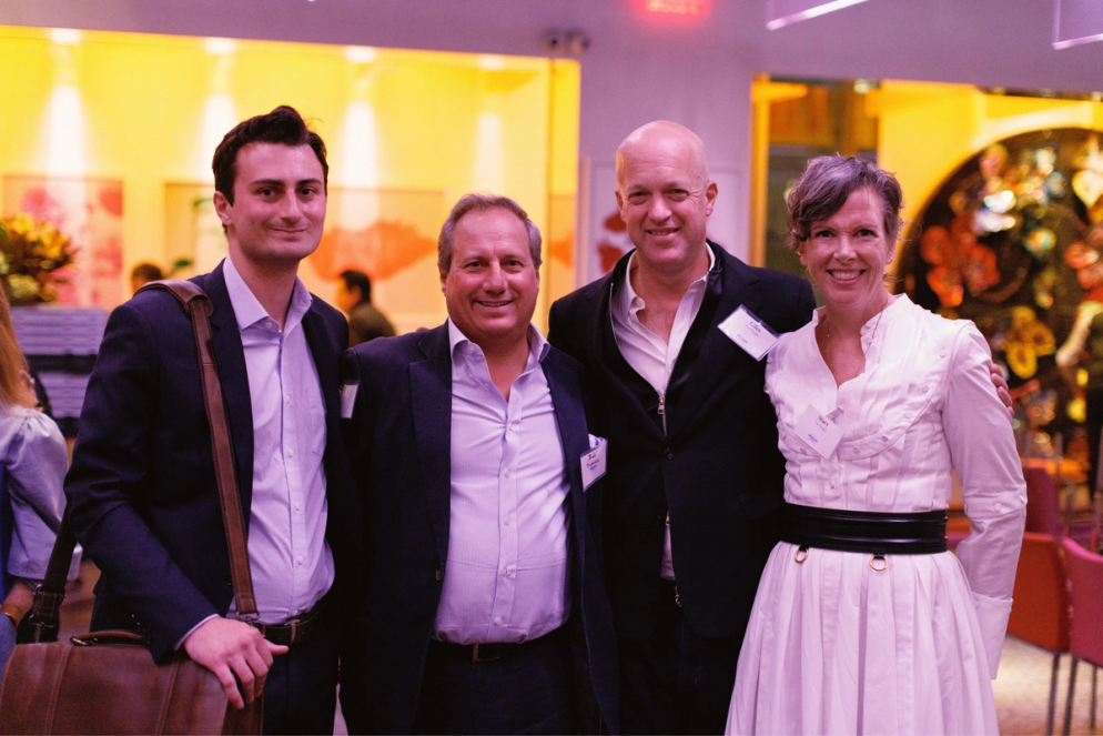 Trustee Stacy Van Praagh '93 at a NYC alumni event alongside her husband Giles