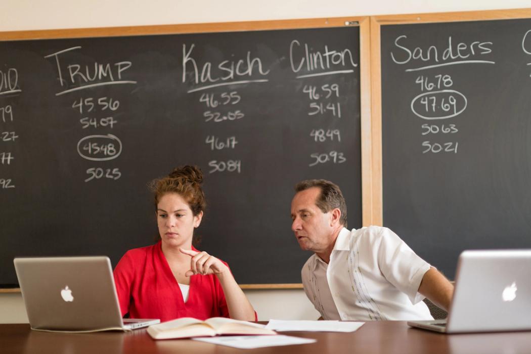 Rollins professor and student work together on a research project.