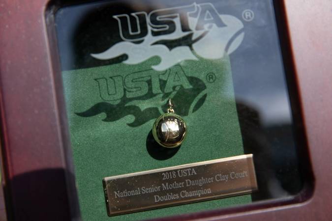 Kaiser and Hutnick's trophy for winning the 2018 USTA National Senior Mother Daughter Clay Court Doubles championship.