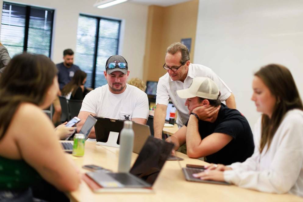 Dr. David Painter in the classroom with students