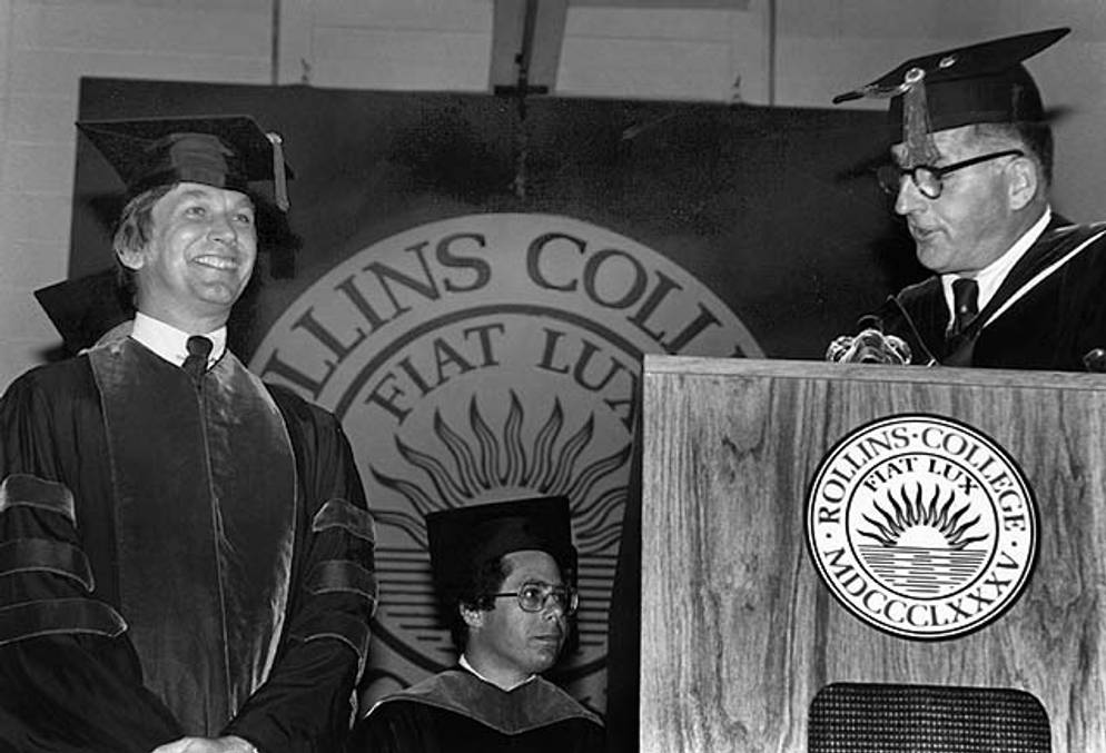 Rollins’ 12th president, Thaddeus Seymour ’82HAL ’90H, recognizes Fred Hicks ’79MSCJ ’80H for his service to the College as acting president.