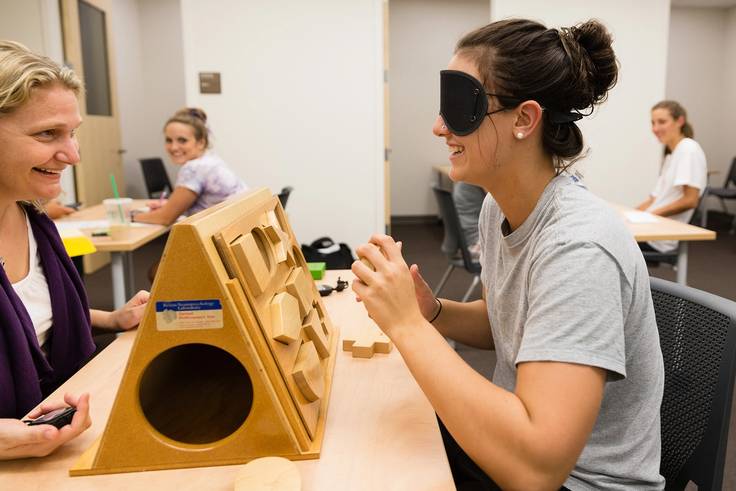 Rollins psychology student is blindfolded and learning without their sight