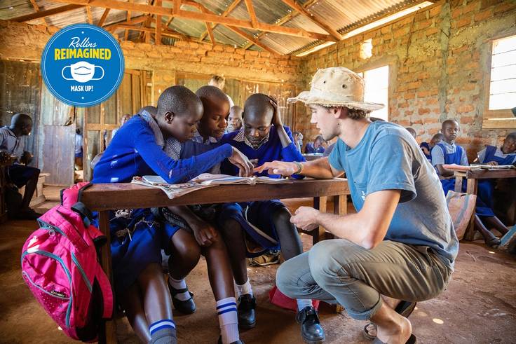 Nico Khazzam ’18 teaching schoolchildren to read on a field study to Tanzania.
