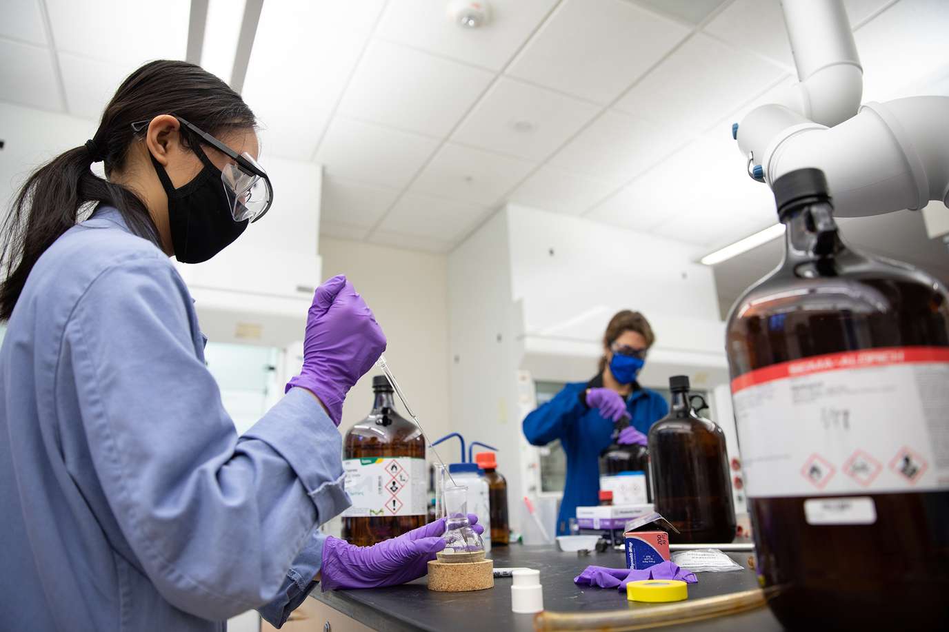 Chemistry major Alyssa Malto and professor Laurel Habgood work together on chemistry research focused on silver properties.