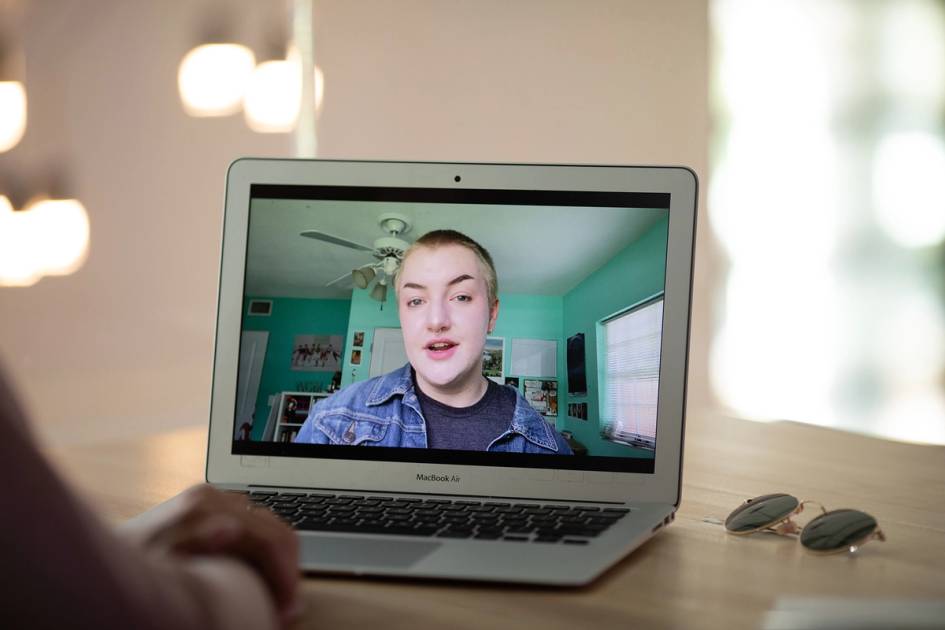 A student video chats with an admission counselor.