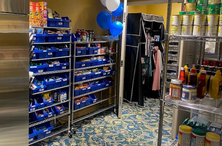Pantry full of dry foods and interview clothes for Rollins students to access.