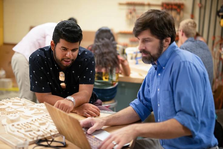 Raul Tavarez Ramirez and studio art professor Josh Almond