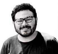 Headshot of Moha Forero Bucheli in black and white. He is wearing a dark colored shirt and glasses