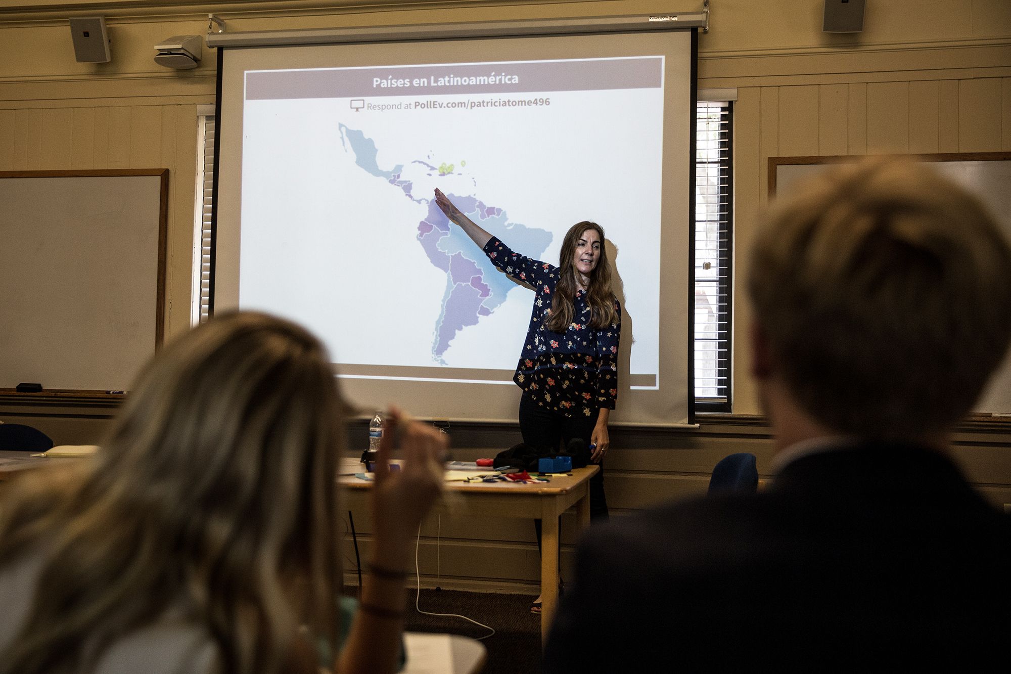 Hispanic studies professor Patricia Tomé gives a lesson on migration.