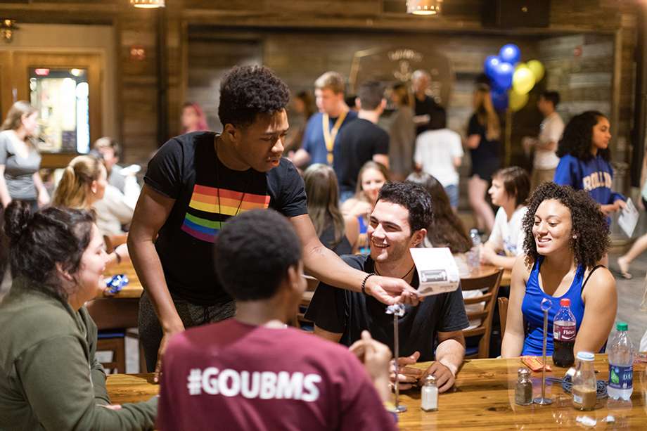 Students participating in Trivia Night in Dave’s Boathouse.