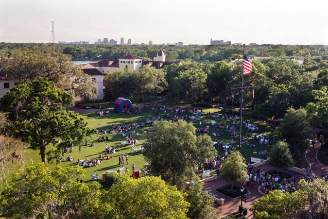 Aerial view of a community picnic on Mills Lawn.