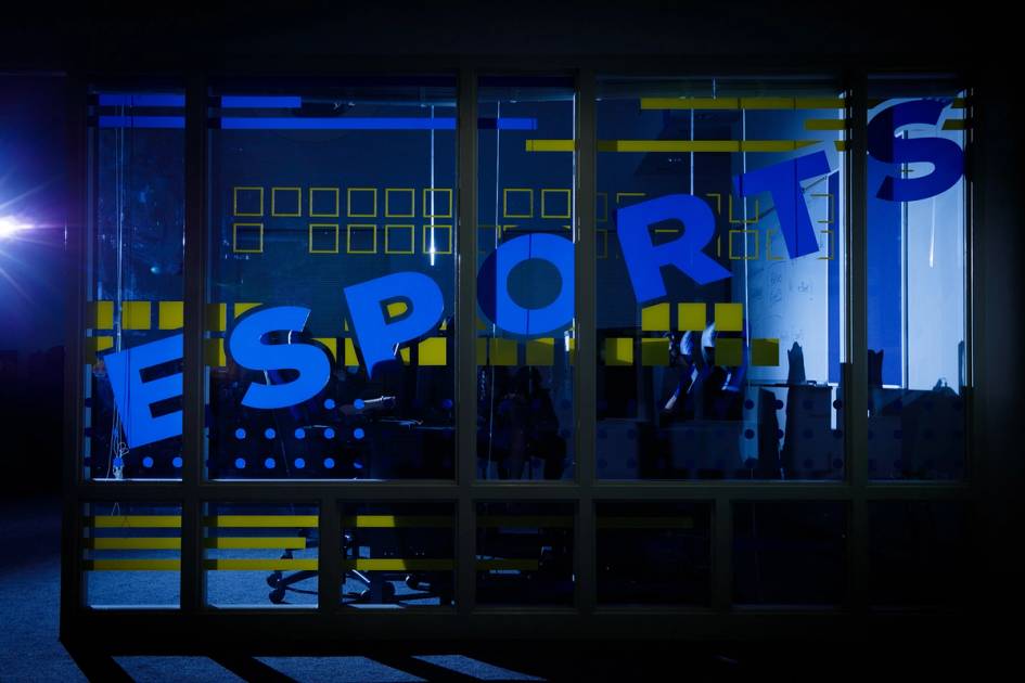 The Esports sign on the windows of Rollins' Esports Club location on campus.