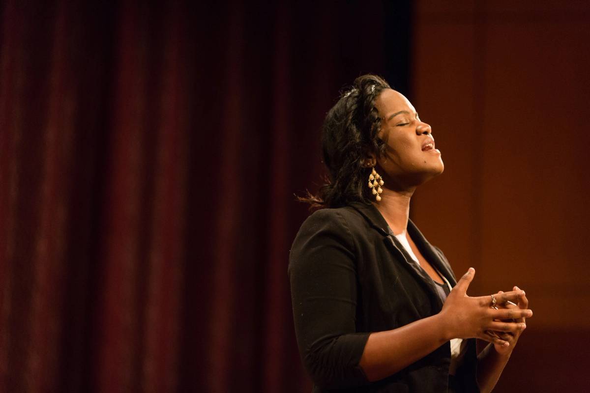 A singer performs at a MLK Day celebration.