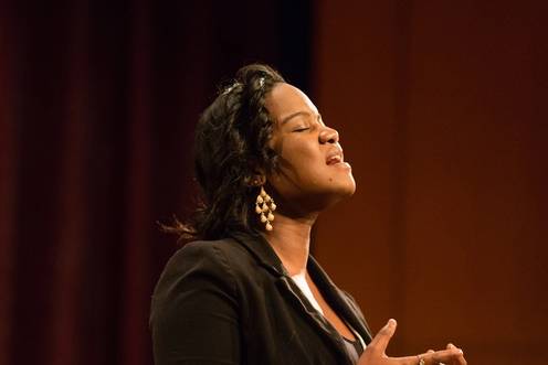 Rollins student soloist sings in the spotlight.