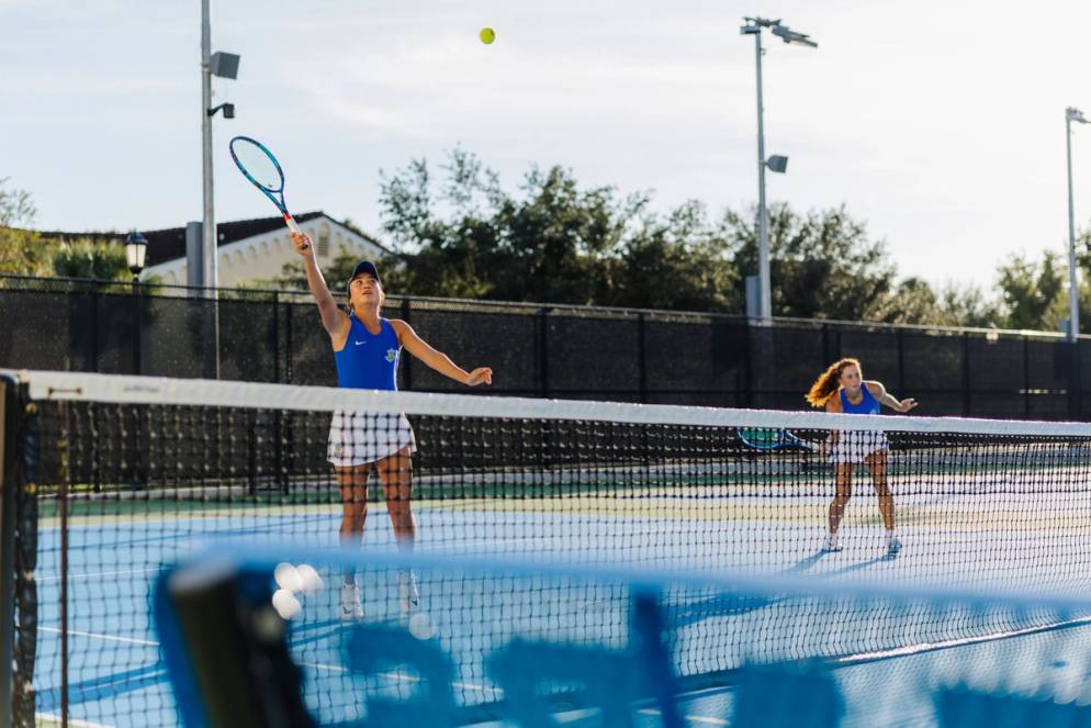 Student-athletes playing tennis