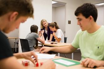 Students test their peers in a psychology class.