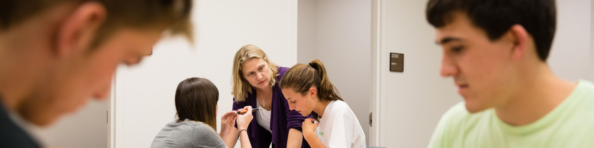 Students test their peers in a psychology class.