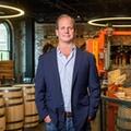 A portrait of Campbell Brown at the Old Forrester distillery in Louisville.