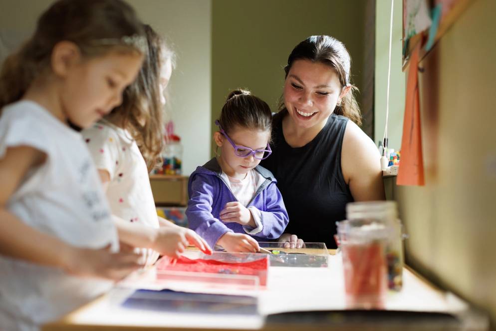 Courtney Trohn ’23 working with children